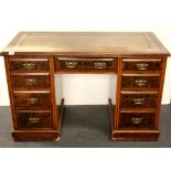 A leather topped Edwardian mahogany and walnut veneered desk, W. 122cm H. 79cm.