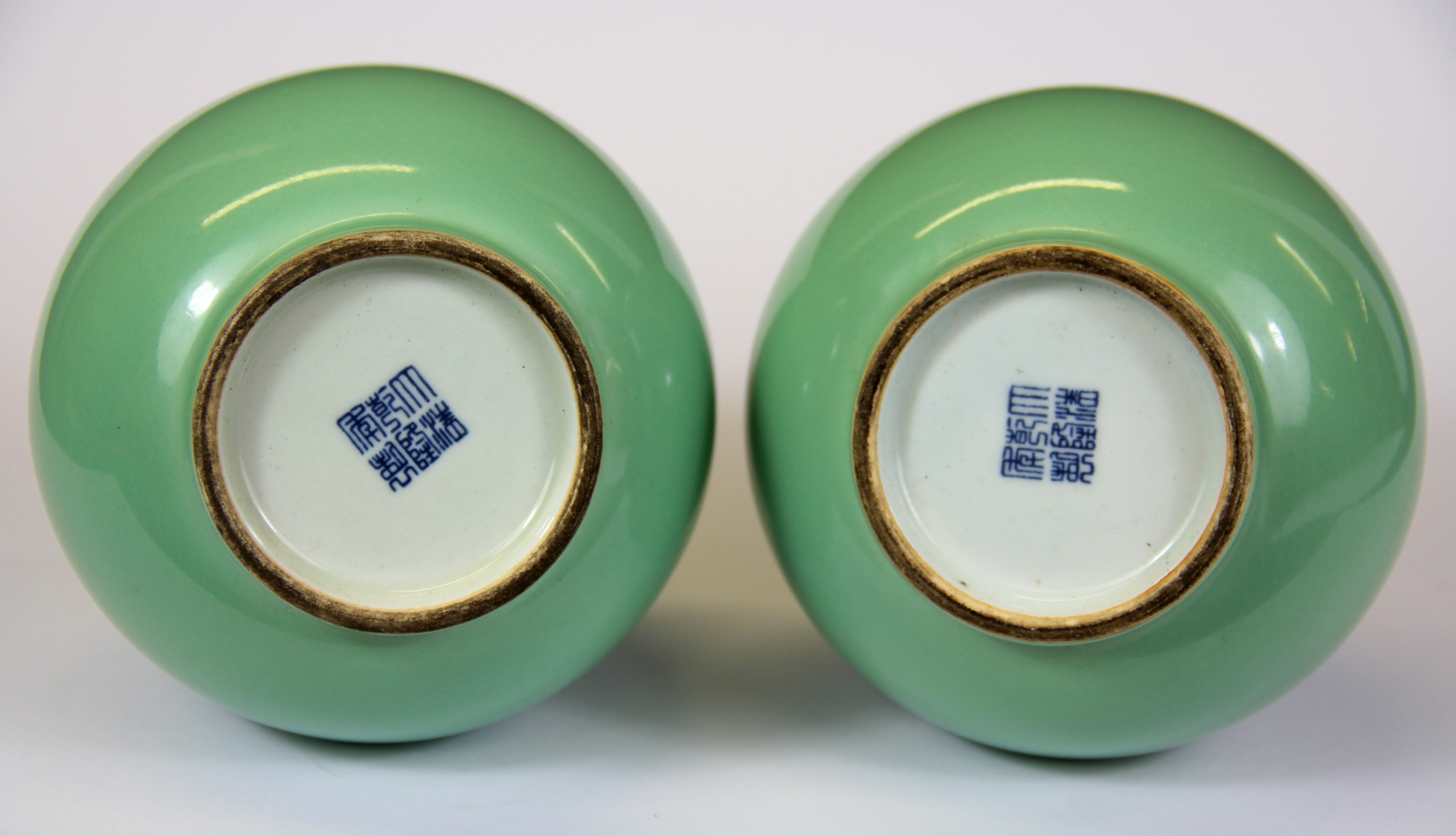 A pair of Chinese celadon glazed porcelain vases, H. 22cm. - Image 2 of 2