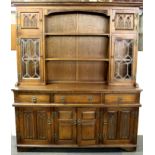 A carved oak Welsh dresser, W. 153cm, H. 182cm.