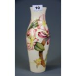 A Moorcroft pottery tube-lined vase, H. 25cm.