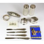 A group of silver and other useful items.