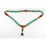 A strand of Tibetan turquoise/ hardstone prayer beads, folded L. 45cm.