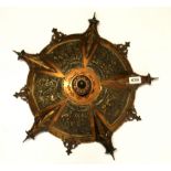 A heavy bronzed and copperized metal ceiling light centrepiece mounted as a wall hanging, Dia.