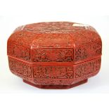 An octagonal Chinese cinnabar lacquer box, 21 x 13cm.