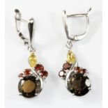 A pair of 925 silver drop earrings set with smokey quartz, garnets and citrines, L. 3.5cm.