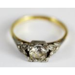 An 18ct yellow gold spinel set solitaire ring, (O).