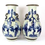 A pair of 19th/ 20th Century Chinese hand painted crackle glazed porcelain vases, H. 40cm.