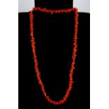 A coral necklace on a metal (tested silver) clasp, L. 80cm.