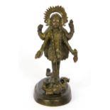 A small 19th/early 20thC Himalayan bronze figure of a four armed deity, H. 14cm. Prov. Anderson-