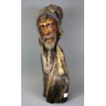 A carved wooden figure of a bearded man, H. 53cm.