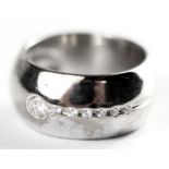 A heavy 18ct white gold diamond set ring, approx. 15.3gr, 0.20ct overall, (Q).