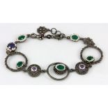 A Hana Maae designer 925 silver gilt bracelet set with green onyx, amethyst and sapphire.