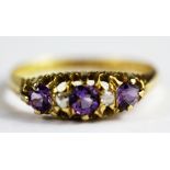 A 18ct yellow gold amethyst and diamond set ring, (Q.5).