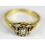 An 18ct yellow gold diamond set solitaire ring, (Q.5).