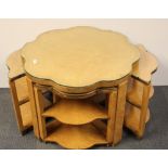 A superb Art Deco birds-eye maple veneered coffee table with a quartet of smaller tables, Dia.
