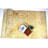 A boxed German compass and a military edition map of the Midlands.