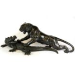 A superb large Japanese bronze Meije period model of a tiger attacking a crocodile, L. 90cm H.