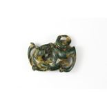 A Chinese archaic form carved jade figure of a dragon, W. 6cm.