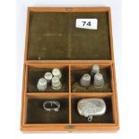 A hallmarked silver vesta case and other items.