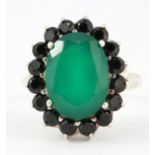 A 925 silver cluster ring set with black and green onyx, (S).