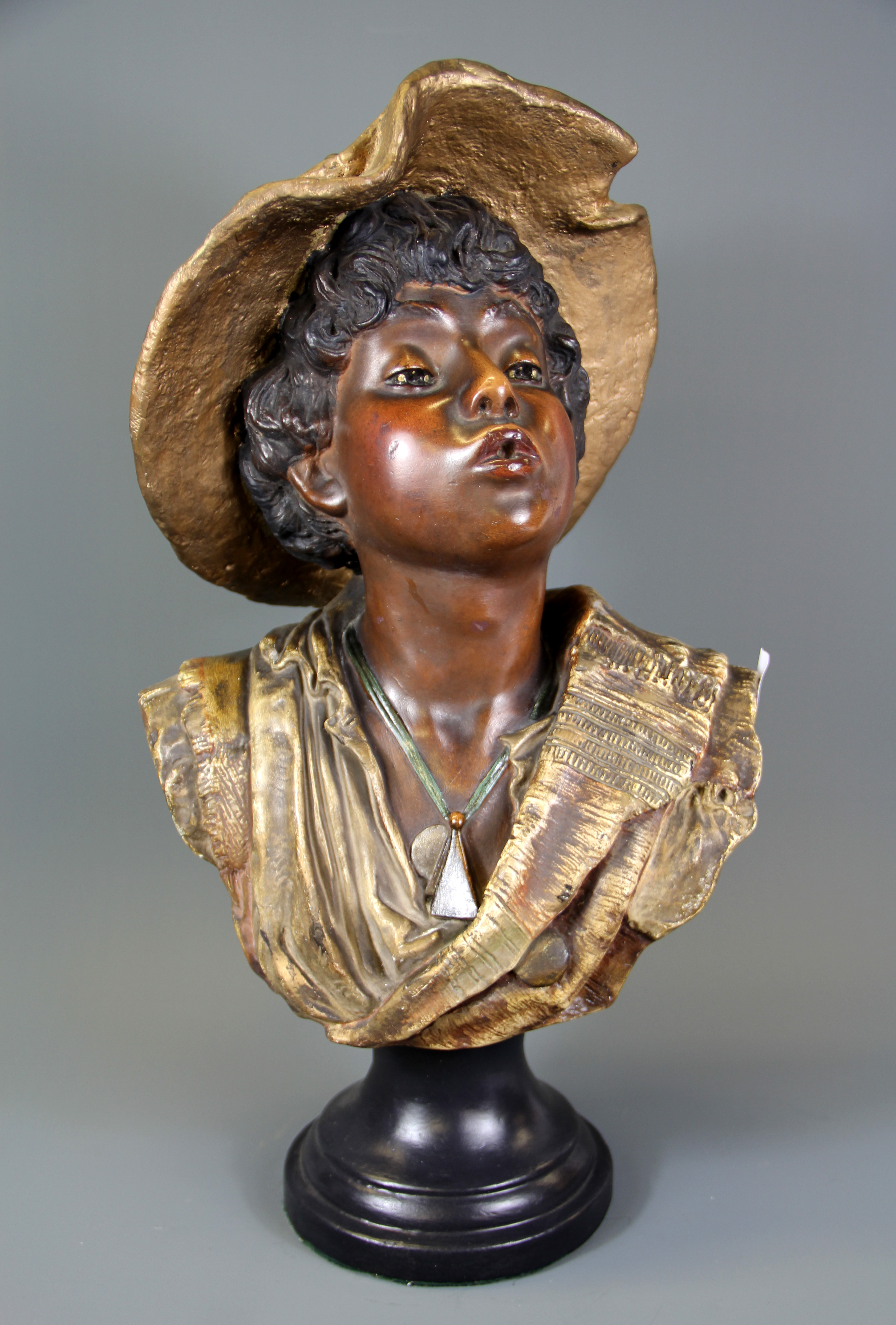 A 19th/ early 20th Century chalk bust of a boy, H. 46cm.