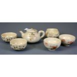 A small Japanese Kutani three piece tea set with additional bowl and two further cups, teapot H.