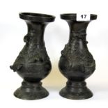 A pair of 19th Century Japanese bronze vases, H.24cm. One A/F to base.