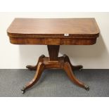 A Regency inlaid mahogany pedestal folding games table, W.91cm H. 73cm.