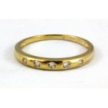 A 14ct yellow gold stone set half eternity ring, (N).