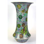 A large Chinese hand enamelled porcelain vase with flared neck and decorated with mythical lions c.