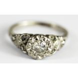 An 18ct white gold diamond set solitaire ring, approx. 0.25ct, (J.5).