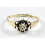 A 9ct yellow gold sapphire and diamond set cluster ring, (M.5).