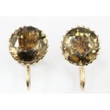A pair of 9ct yellow gold (stamped 9ct) smokey quartz set screw back fitter earrings.