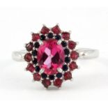 A 925 silver sapphire and ruby set cluster ring, (N.5).