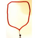 A single strand of Tibetan orange jade prayer beads, Dia. 13mm.