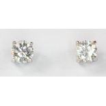 A pair of 18ct white gold diamond set stud earrings, approx. 0.5ct overall.