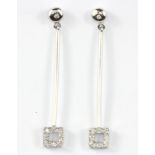 A pair of 9ct white gold stone set drop earrings, L. 4.5cm.