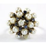 A 14ct yellow gold (stamped 14k) sapphire and pearl set large cluster ring, (Q.5).