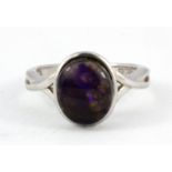 A 925 silver cabochon cut black opal set ring, (M).