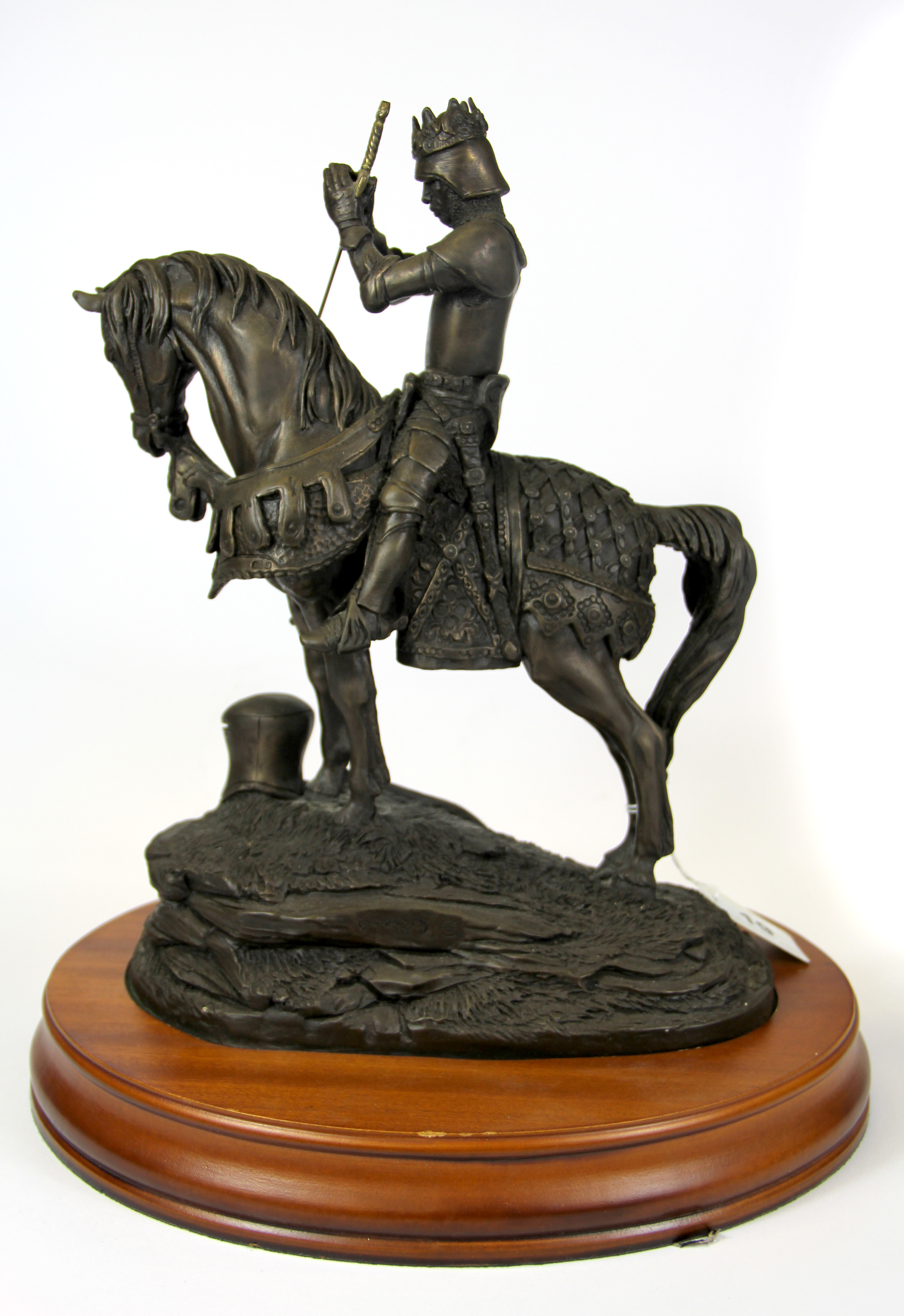 A Heredities figure of St. Crispin's Day on a wooden base, H. 35cm.