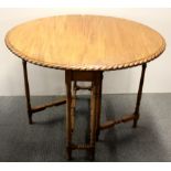 A folding drop leaf tea table, W. 80cm.