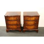 A pair of mahogany three drawer bedside cabinets, W. 53cm H. 66cm.