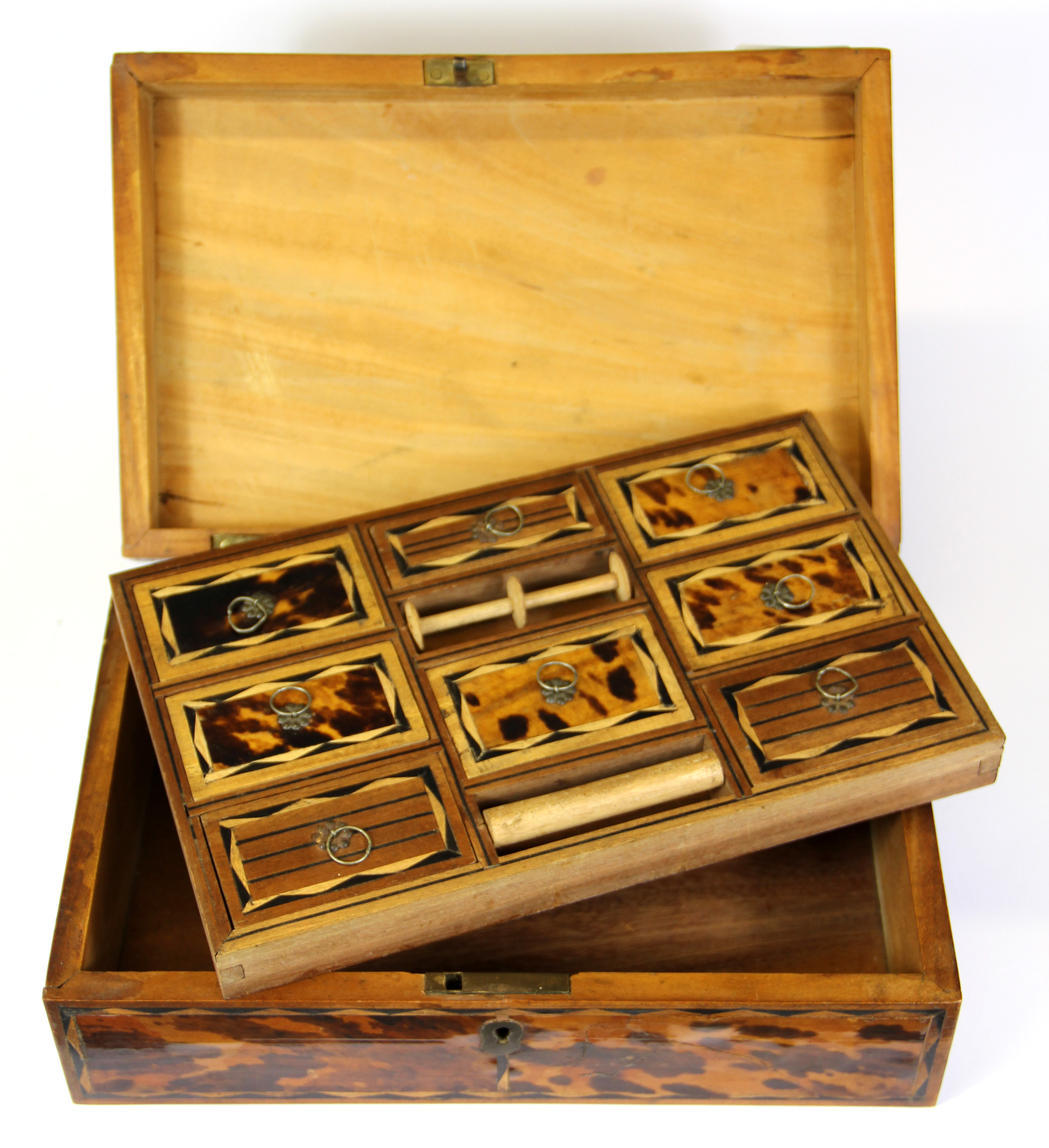 A 19th Century tortoise shell veneered workbox, 24 x 16 x 8cm.