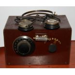 An early crystal radio set with earphones, size. 30 x 18cm.