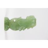 A finely carved Chinese celadon green jade /hardstone figure of a fish with a dragon's head, H. 7.