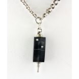 A silver Albert chain with a Domino shaped fob key.