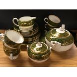 A Wedgwood gilt and green glazed bone china tea set, Florentine pattern.