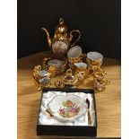 A gilt china coffee set and other items.