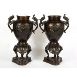 A pair of 19th Century Japanese bronze vases, H. 21cm.