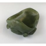 A Chinese carved nephrite jade brush washing bowl, W. 8cm.